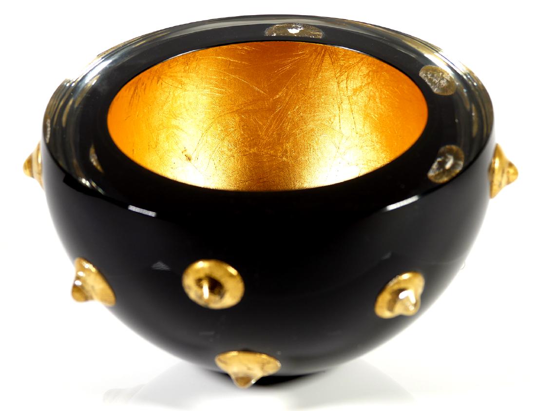 MOLLY STONE, Blown Glass Bowl: Black art glass bowl with metallic fleck adornments. Signed "M. Stone" near base and dated 1994. Measures 6" tall. Excellent condition.