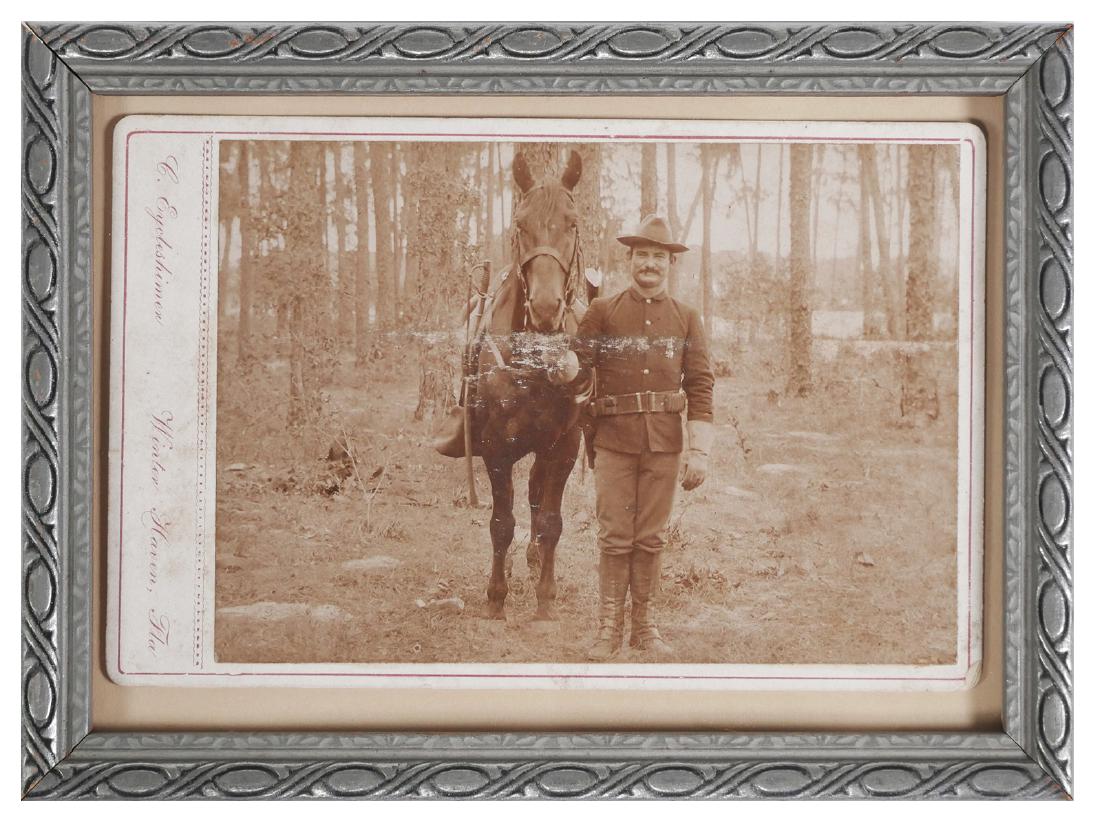 ROUGH RIDERS Cavalry Soldier Florida Photo 1898: Cabinet photograph of a U.S. cavalryman with his horse, taken by a Winter Haven, Florida, photo studio. Circa 1898 (when the cavalry came to Tampa). Under glass. Creased, with some wear across image. 