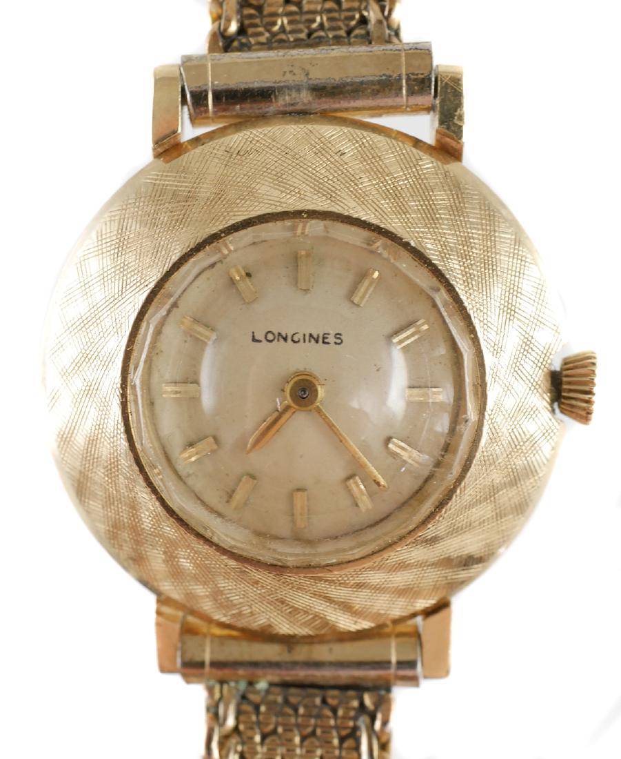 LONGINES Wittnauer 14k Gold Ladies Watch: Vintage Longines wristwatch with 17j movement. Runs for a short time -- needs routine maintenance. 14k gold case measures about 3/4" diameter.