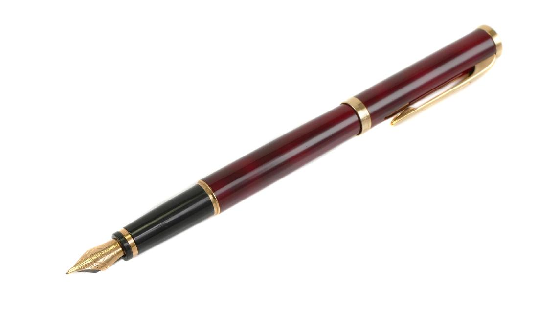 WATERMAN Preface Red 18k Gold Nib Fountain Pen: WATERMAN Preface red lacquer 18k gold nib fountain pen. Nib is marked with logo, Paris 18K 750. Feed is marked M. Pen measures approx. 5 6/16" capped. Box and Waterman booklet included. No damage, exc