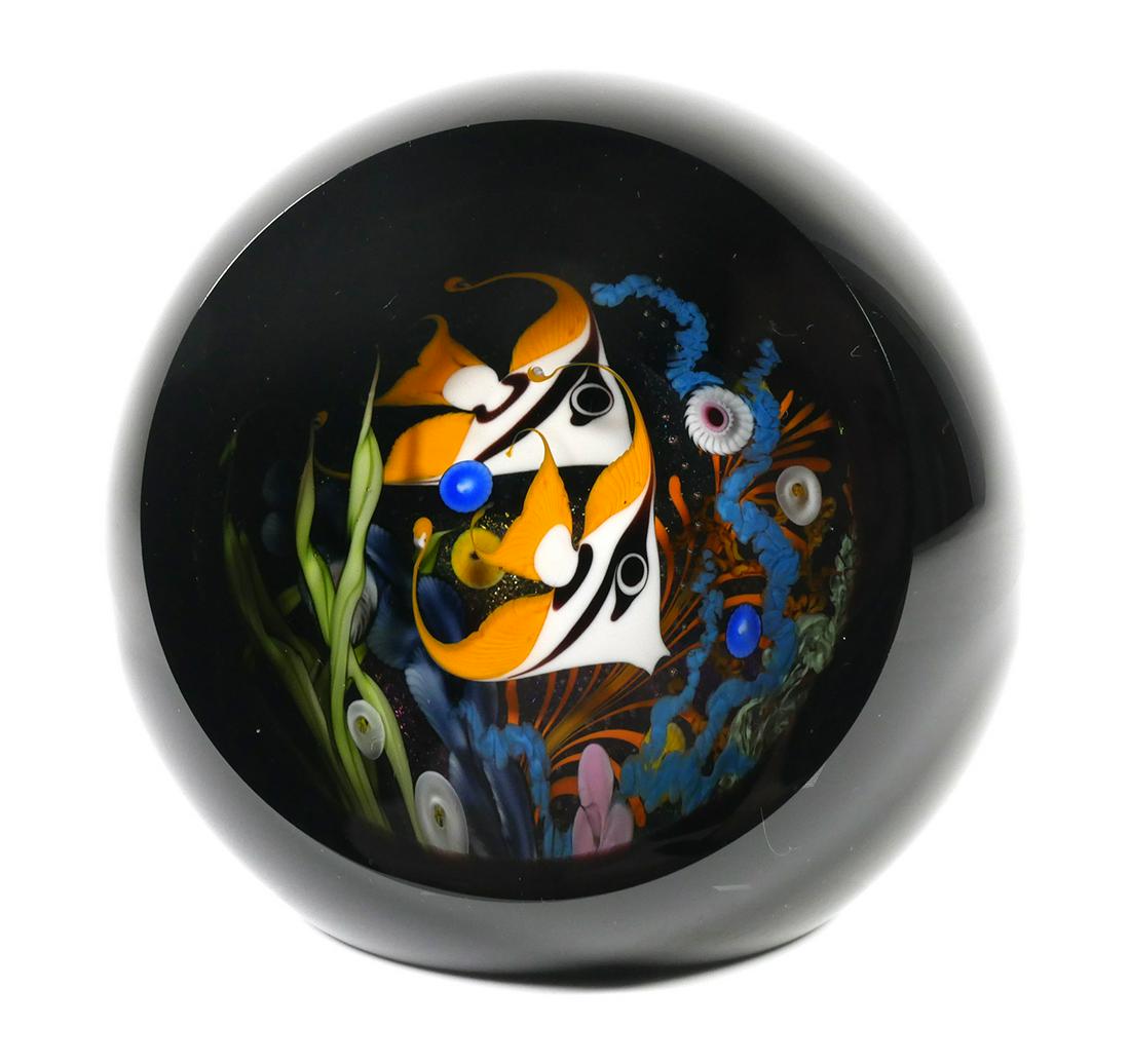 STUART ABELMAN, Fish Tank Art Glass Paperweight: Spherical art glass sculpture depicting two fish. Designed to be displayed on a lighted stand, illuminating the interior of the ball. Signed "Abelman" under the base, along with serial numbers and the