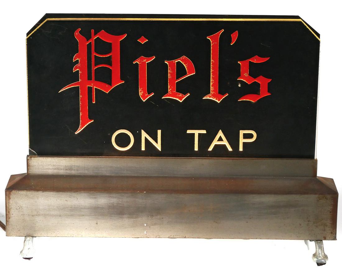 Breweriana, Piel's Beer Lighted Counter Sign: Lighted bar counter sign for Piel's Beer On Tap. Piels is/was brewed in Brooklyn, New York. Etched and reverse painted on glass along with a electric lighted base. Circa early 20th century. Chips to l