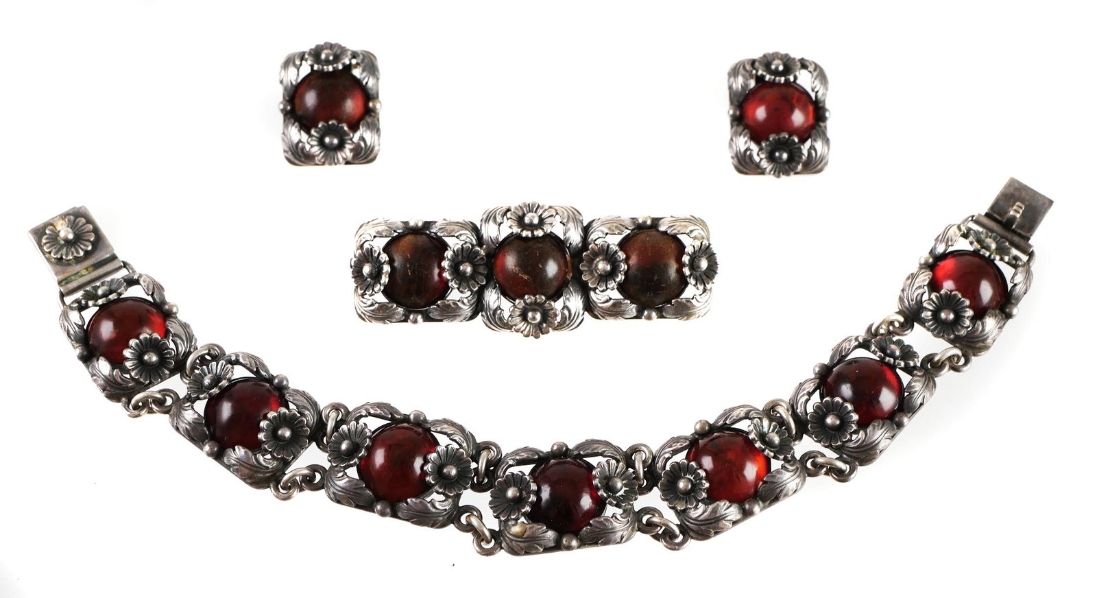 NIELS ERIK FROM Denmark Sterling Amber Parure: Vintage sterling silver and amber demi-parure, consisting of a bracelet, (clip) earrings and a bar pin, all by Danish jewelry designer N.E. From, all signed. Bracelet measures 7-1/2" long.