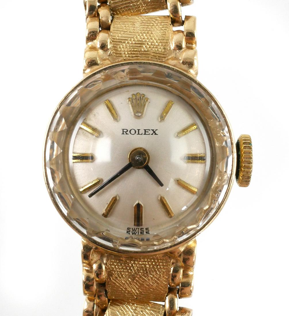 Vintage ROLEX Ladies 14k Gold Watch: Early-mid 20th century Rolex ladies wristwatch in 14k yellow gold. Not overwound, but needs routine servicing. Clean caliber 1400 movement, 17j. Back of case has a couple of tiny dings, with scratches