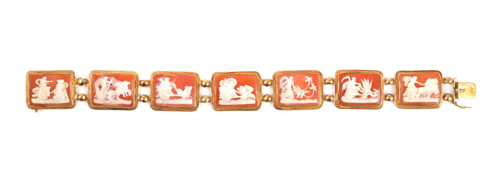 14k Gold Carved Shell Cameo Panels Bracelet: Antique Victorian or Edwardian carved shell cameos mounted in 14k yellow gold. Classical scenes, each one including a chariot. Measures 8" long and 11/16" wide.