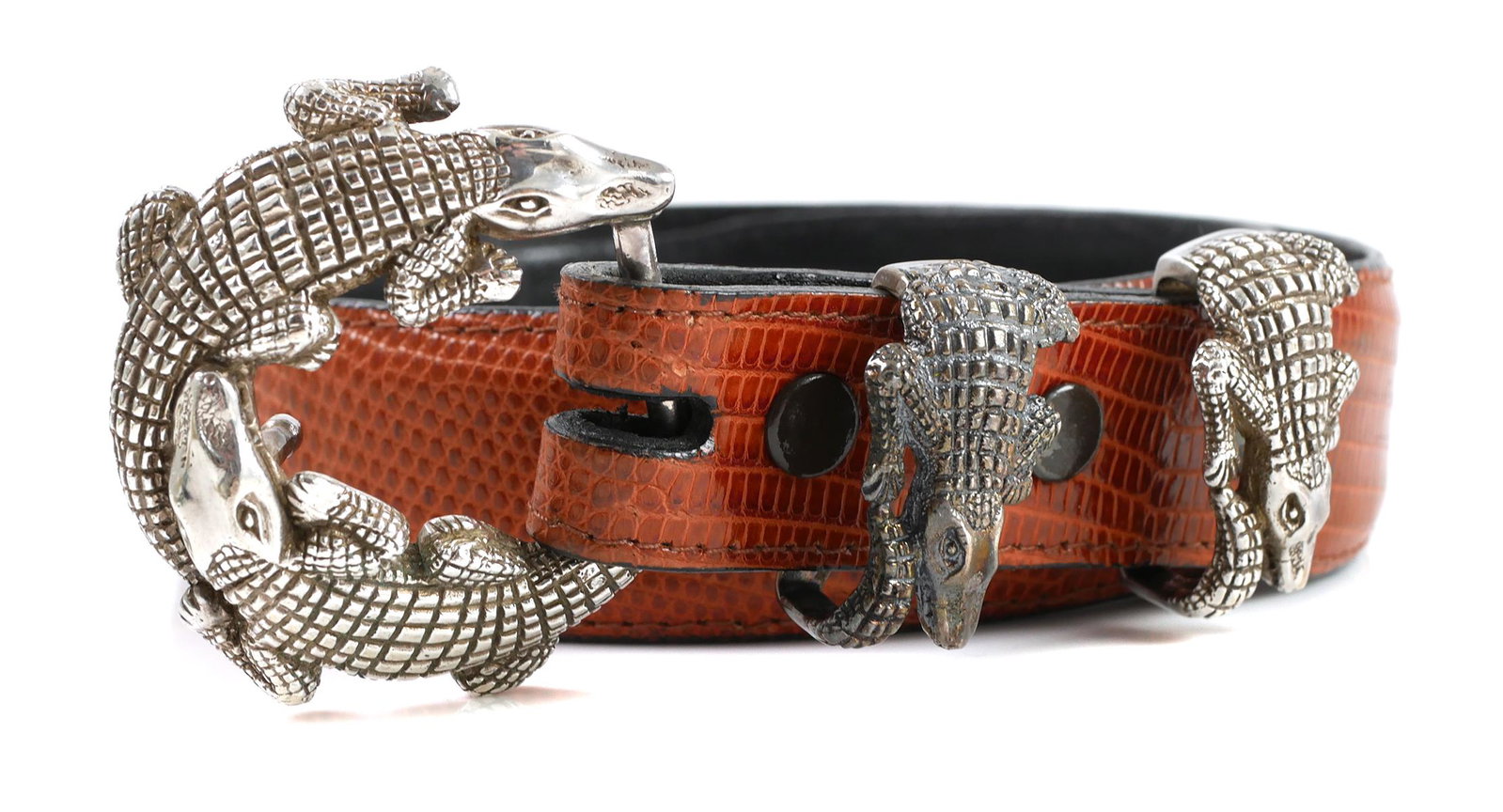Sterling Belt Buckle & Belt, Alligators: Belt with sterling silver buckle and loops, marked "J.DEEGAN" for Jeff Deegan. Buckle and loops in the form of alligators. Circa 1990s. Excellent condition with only minor wear to belts and no damage 