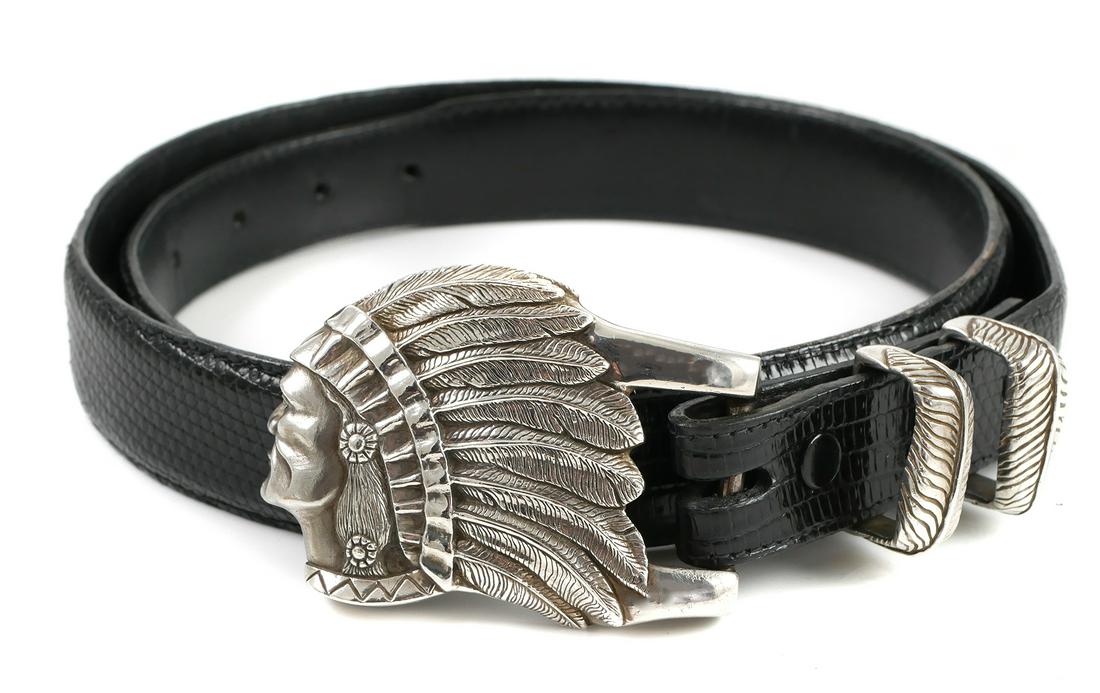 Sterling Belt Buckle & Belt, Native American: Belt with sterling silver buckle and loops, marked "J.DEEGAN" for Jeff Deegan. Buckle in the form of a Native American Chief. Circa 1992. Excellent condition with only minor wear to belts and no damag