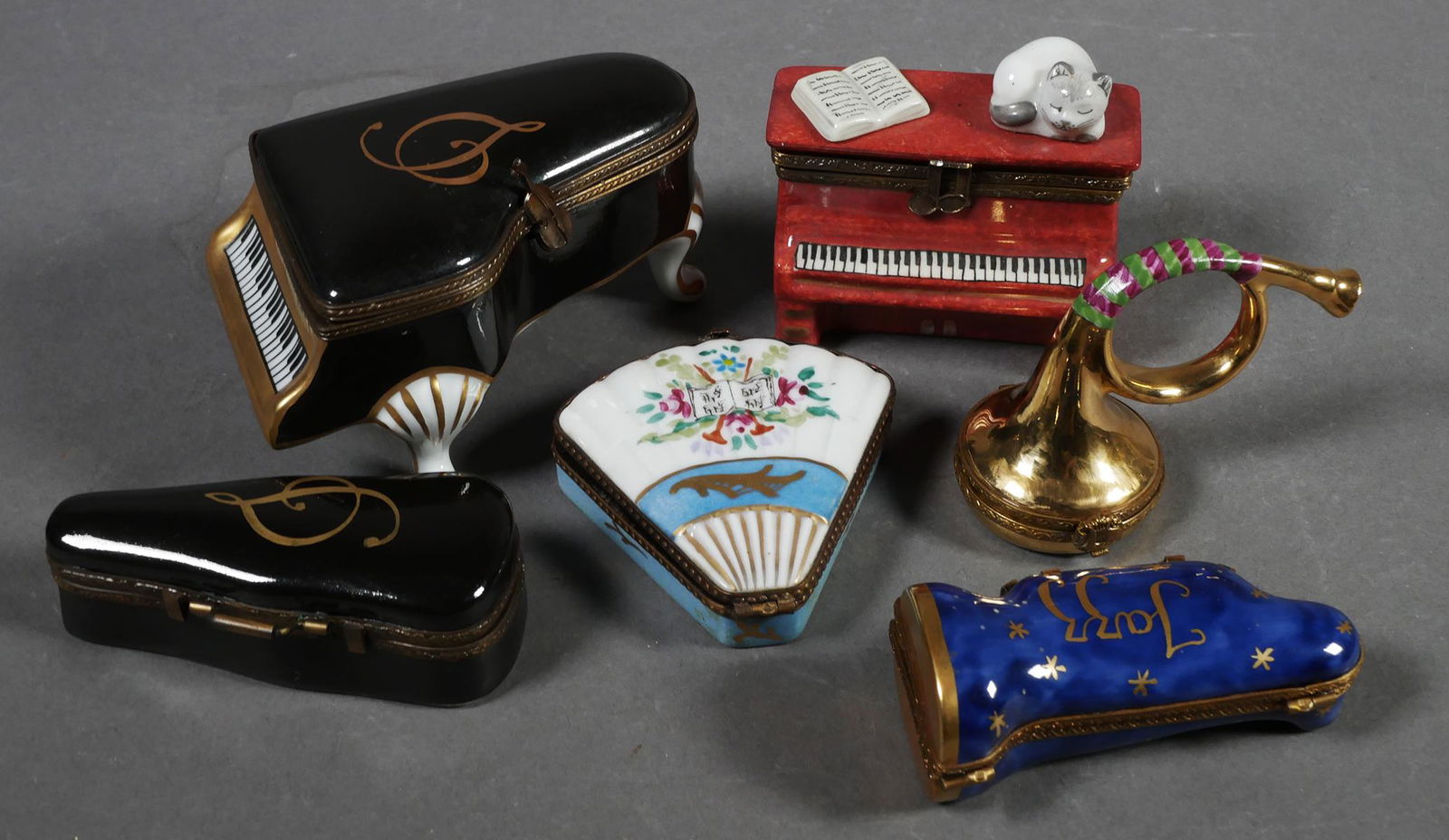 (6) LIMOGES France Porcelain Trinket Box: Collection of 6 Peint Main (hand painted) Limoges France porcelain trinket boxes. Horn, violin, trumpet, pianos & white fan boxes are all marked Limoges France. Horn, pianos & violin are all signed an