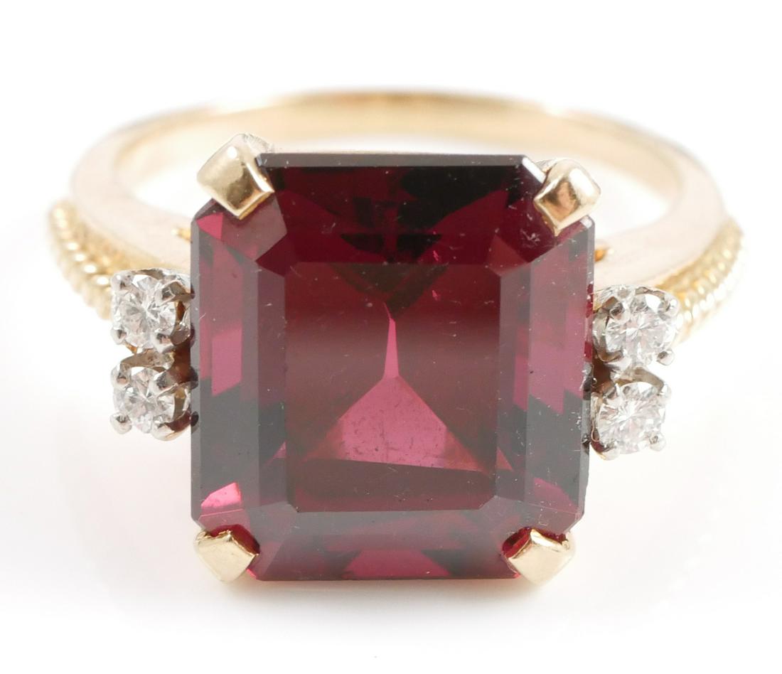 14K GARNET & DIAMOND Ring: 14K yellow gold ring contains one emerald cut garnet. Weight: 10.00 Ct. Approx. 4 round brilliant cut diamonds. Weight: .16 Ct. Approx. Rated VS in clarity and G-H in color. Size 7.
