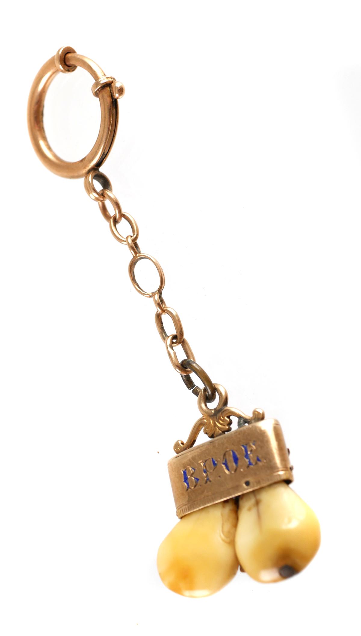 Old 10k Gold ELKS Teeth BPOE Watch Fob: Antique BPOE watch chain and fob. 10k gold (tested) frame holds two elk teeth. Chain and loop are gold filled. Measures 3 1/2" long.