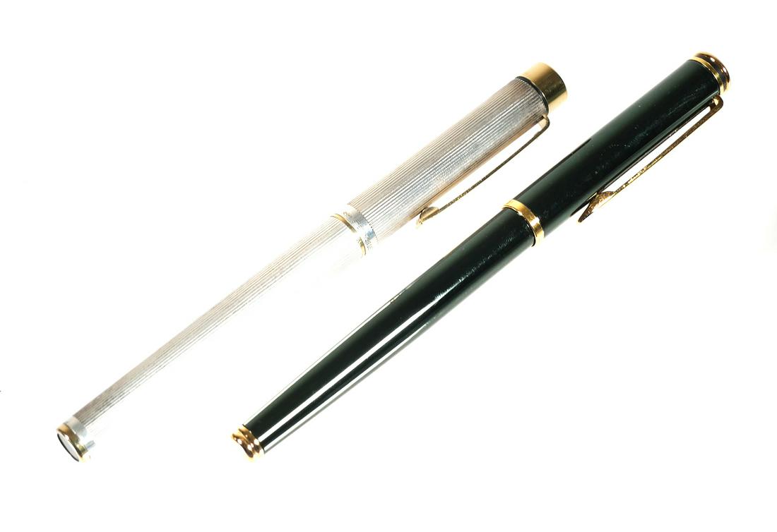 (2) Fountain Pens, Sheaffer, Waterman, Sterling: One SHEAFFER sterling silver Targa with 14K gold nib fountain pen. Nib is marked Sheaffer, USA, 585 14K. Cap & barrel are both marked 925. Pen is approx. 5 5/16" capped. Box, user guide, converter (in