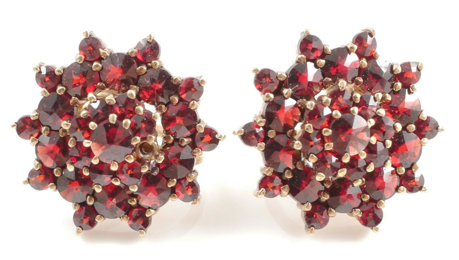 14K GARNET Earrings: 14K yellow gold cluster earrings contain 58 round faceted garnets. WEIGHT: 5.00 Ct. Approx. French screw backs. Overall weight: 6.5 grams.