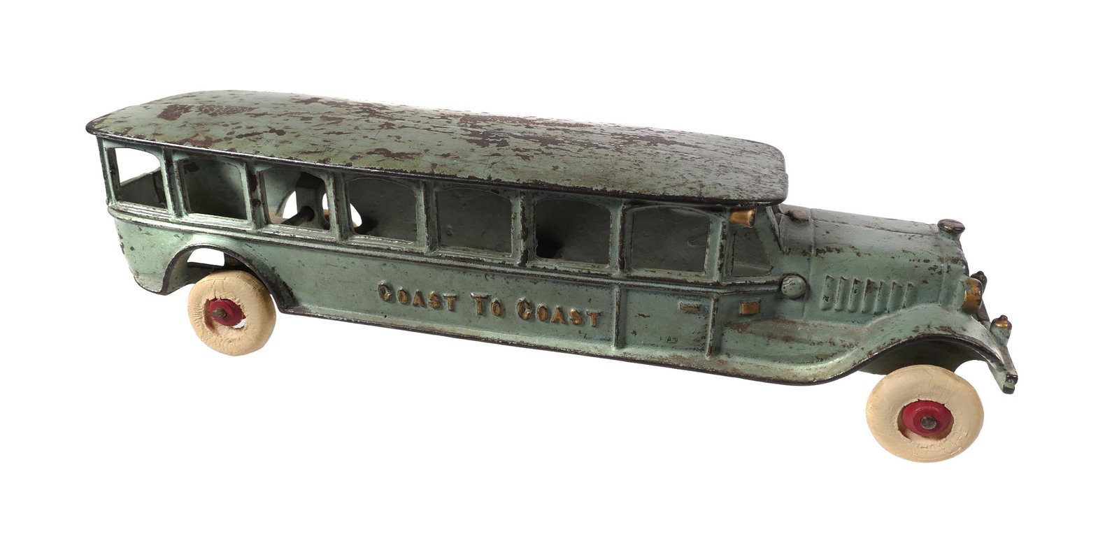 HUBLEY Large Cast Iron Coast to Coast Toy Bus: HUBLEY cast iron "Coast to Coast" toy bus. Bus measures 13" in length. Bus has wear & paint loss. 3 of 4 tires are hard & loose on the rim, one tire appears to have been replaced. Blackwell Auctions g