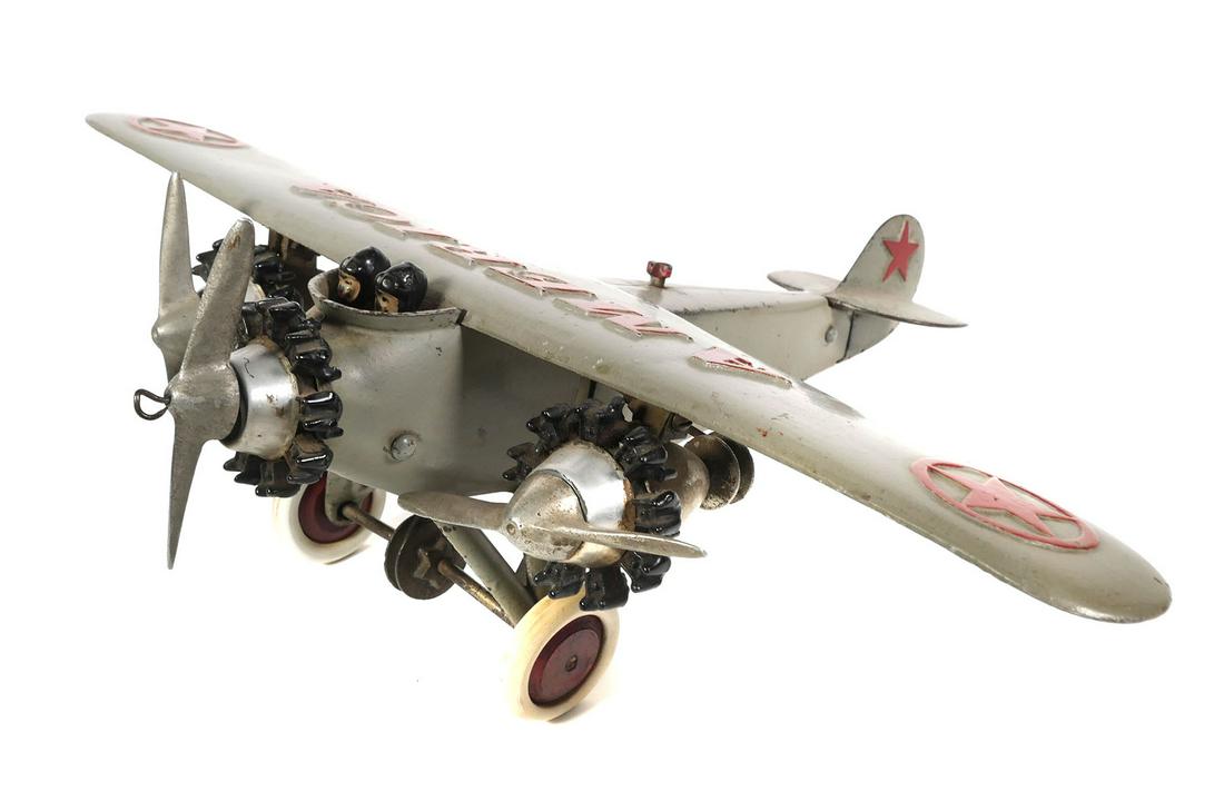 HUBLEY Cast Iron Tri Motor AMERICA Airplane 17": Rare large Hubley cast iron tri-motor "America" plane. Approx. 17" wingspan x 14" long. Fuselage is stamped on the inside 1705 L2 & 1706 R1. Plane has wear & paint loss. Left wingtip has a slight bend