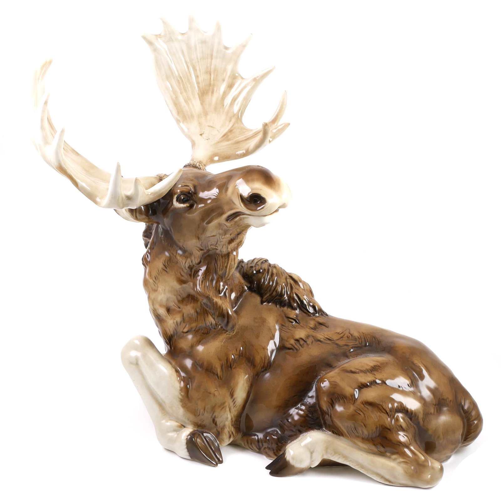 17" Hutschenreuther Figure of a Moose: Porcelain statue of a moose, by Hutschenreuther, mid-20th century. Manufacturer's marks and paper label affixed under base. Measures 17" tall. Excellent condition with no cracks, chips or damage.