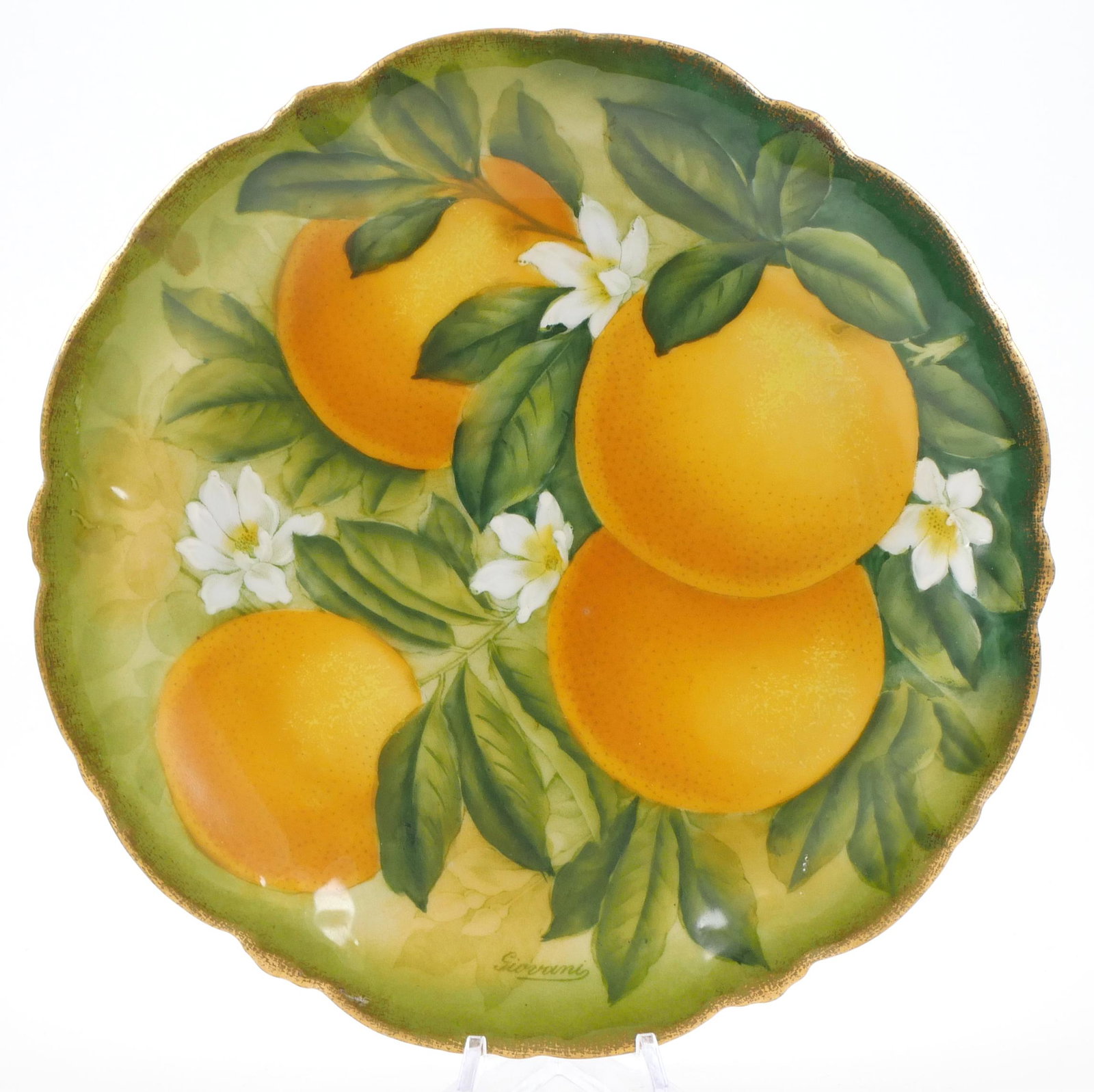 ST. AUGUSTINE Vintage Souvenir Plate: This 8" Bavarian souvenir plate is bursting with handpainted oranges and was imported for W. H. DuBois, owner of El Unico store in St. Augustine according to stampings on the back. Excellent condition