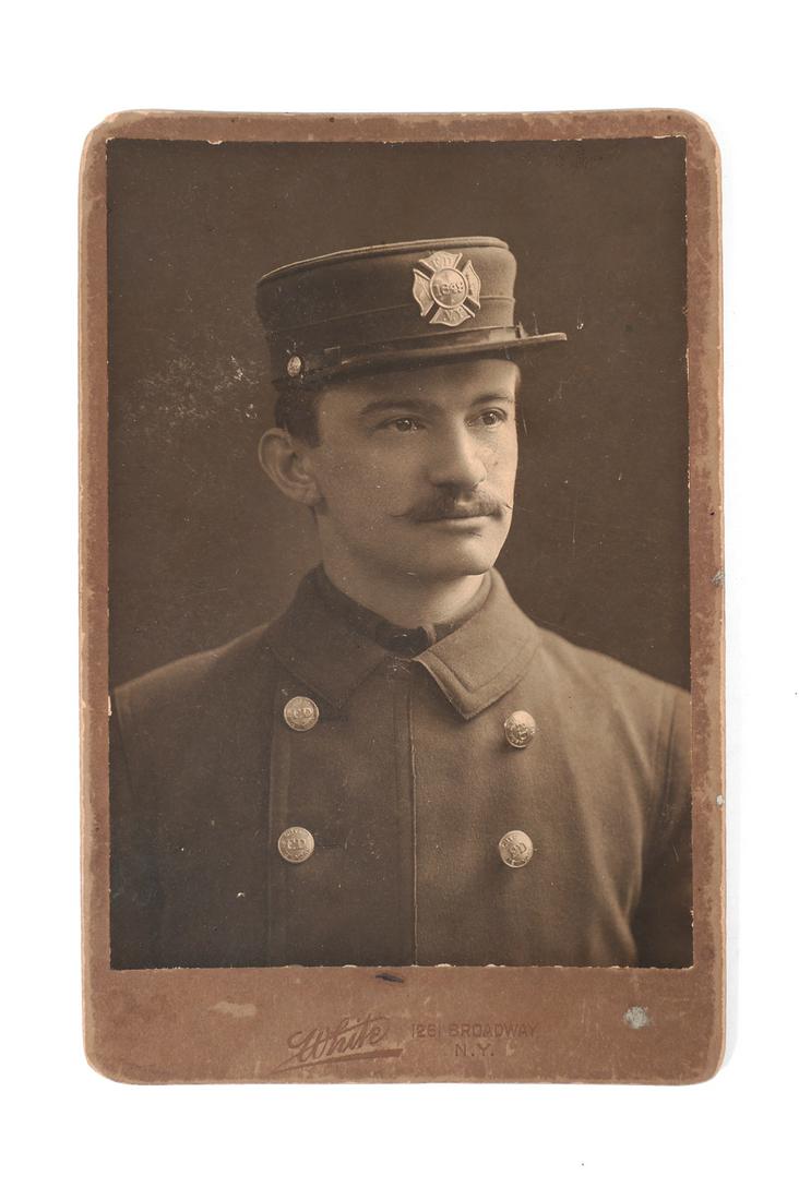 19C NYFD Firefighter Cabinet Photograph: Antique 19th century fireman portrait. Cap badge indicates that he served with the New York Fire Dept. Measures 6-1/2" x 4-1/4" overall.