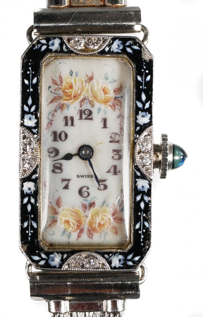 PATEK PHILIPPE Art Deco Platinum Watch: Ladies' Patek Philippe wristwatch with platinum case. Handpainted dial surrounded by painted enamel frame, accented with four diamonds. Minute flake in upper right corner of enameling. Movement marked