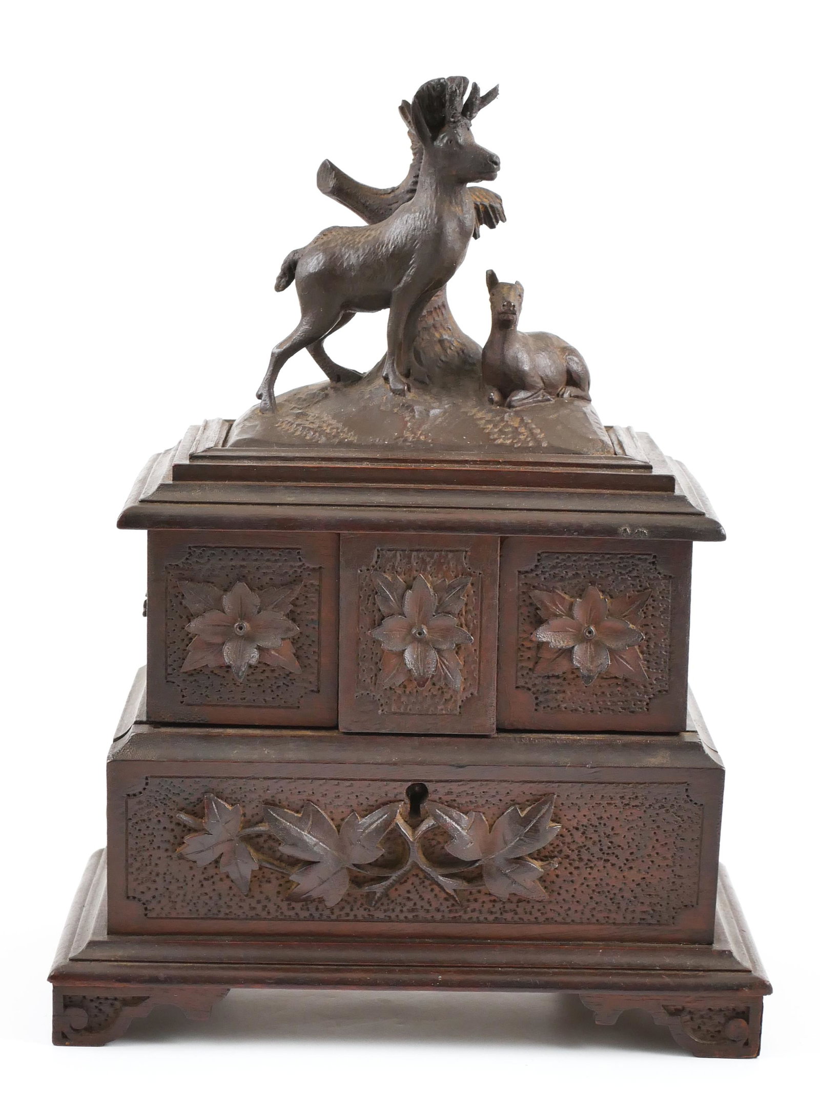 Old BLACK FOREST Carved Jewelry Box: Antique Black Forest jewelry or trinket box with two deer carved on lid. Lid opens to release two hinged boxes that can be swung out to access main compartment. Interior has tufted satin lining. Measu
