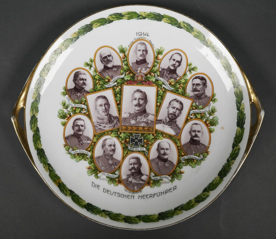 1914 Imperial German WWI Cake Plate: Scarce Royal Rudolstadt handled plate, measuring 12-3/8" handle to handle. Depicts German leaders, including Kaiser Wilhelm, von Hindenburg, et al. Some gilt wear. No cracks or crazing. Very small and