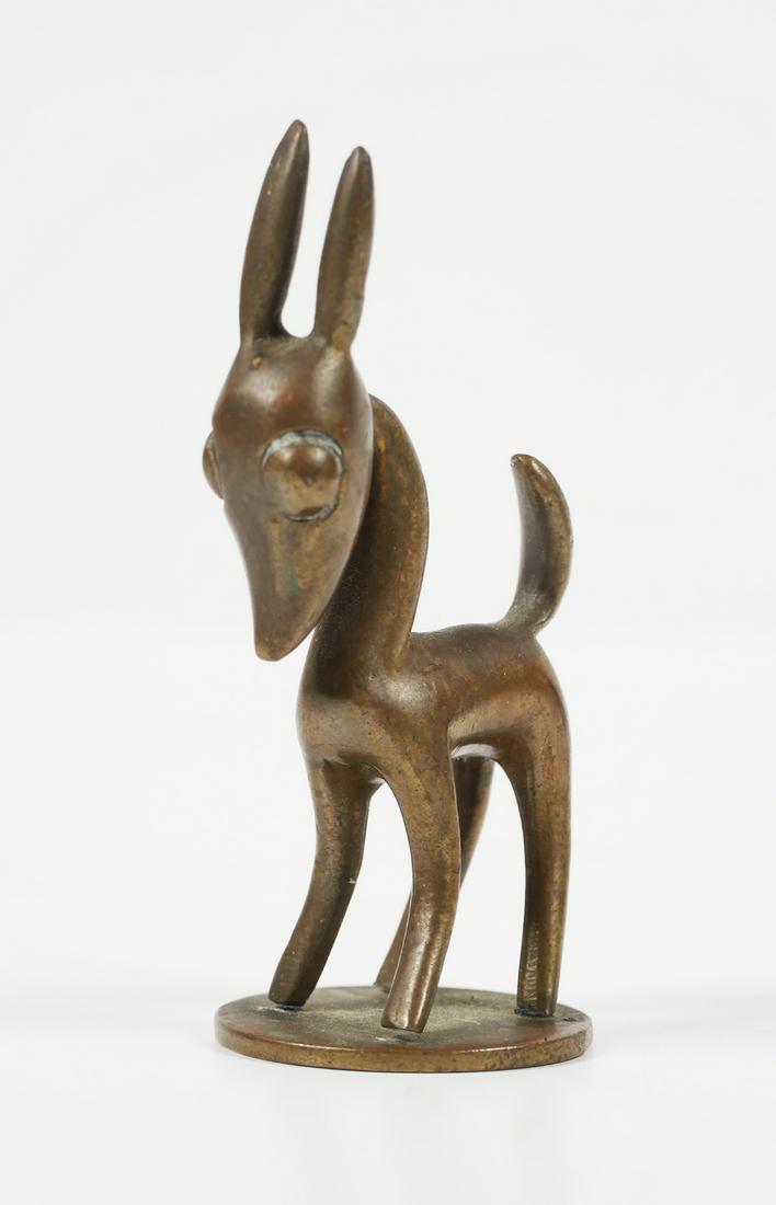 Hagenauer Bambi Figurine Cast Bronze: This cast bronze 2-1/2 fawn has been called "Bambi" in the Hagenauer catalog, # 1279 in their catalog of the early 1940s. The bottom is stamped wHw, standing for the Hagenauer Werkstatte Wein, and "ma
