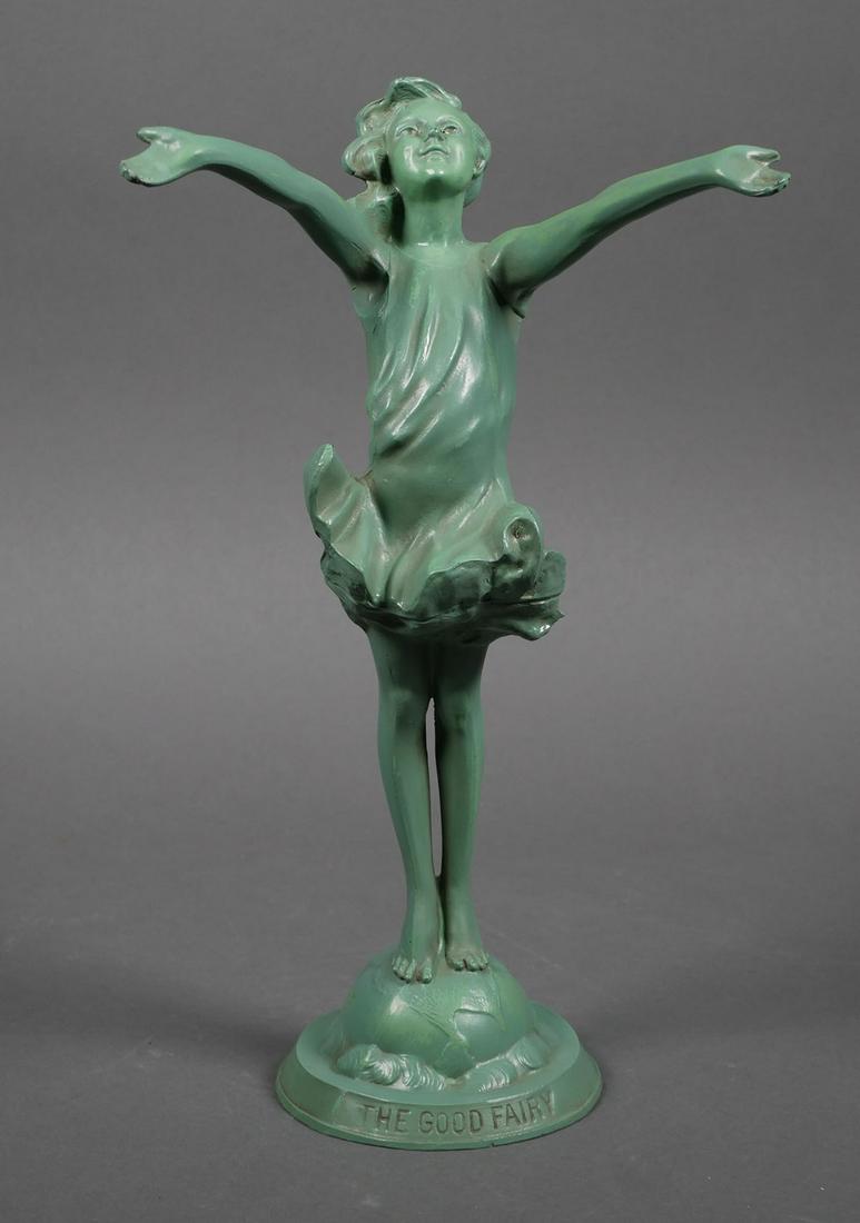 1916 The Good Fairy Sculpture: Early pre Art Deco style statue of "The Good Fairy," dated 1916, manufactured by Chicago doll maker, Jessie McCutcheon Raleigh. Signed JMR on back of base. When viewed from the left side, the figure i