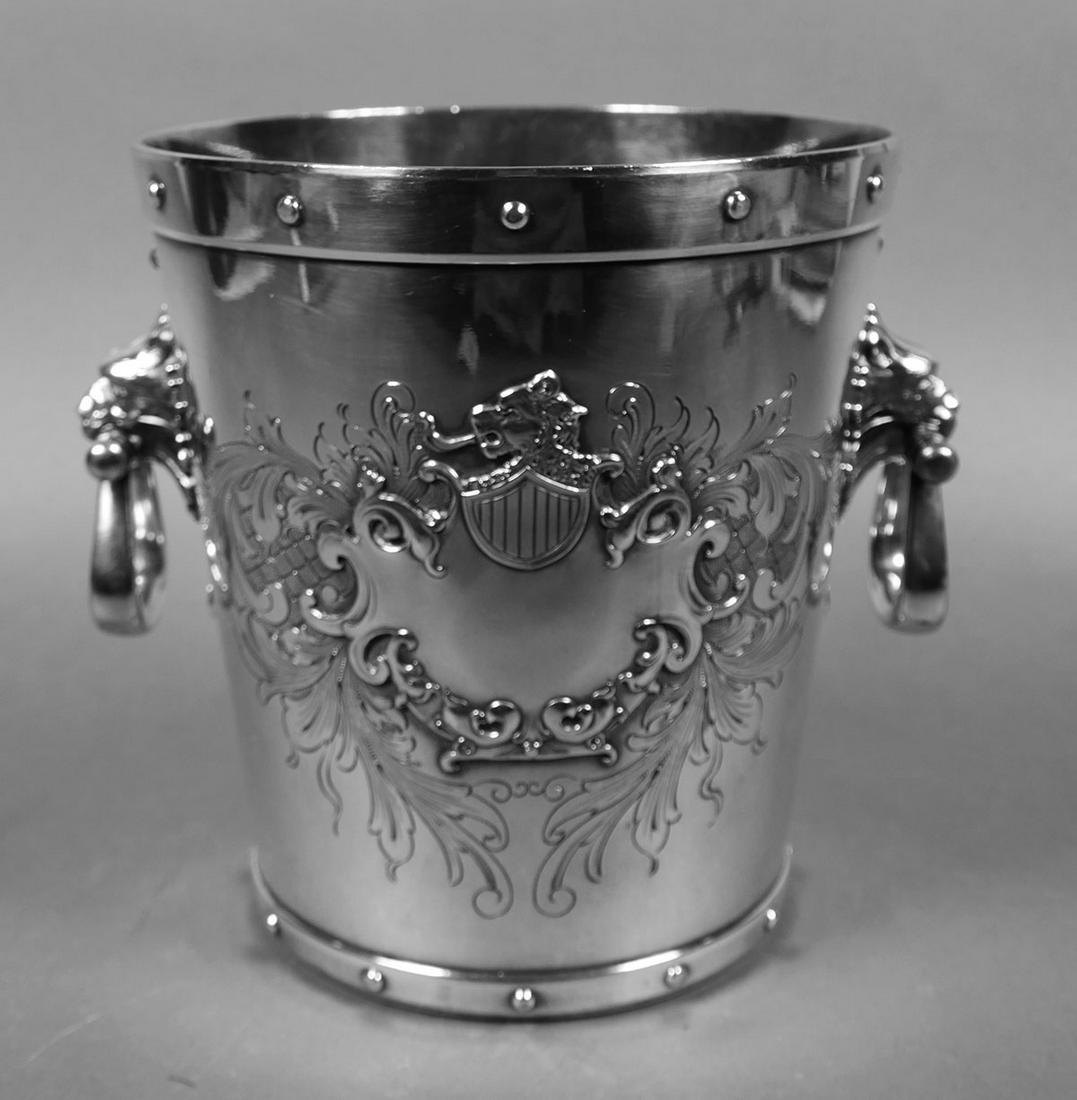 Victorian Silverplate Ice Bucket Wine Cooler: Meriden silver plated ice bucket or wine bottle cooler, measuring 8-3/8" high and 7-1/2" diameter at rim. No monogram. Fine condition, with minimal wear.