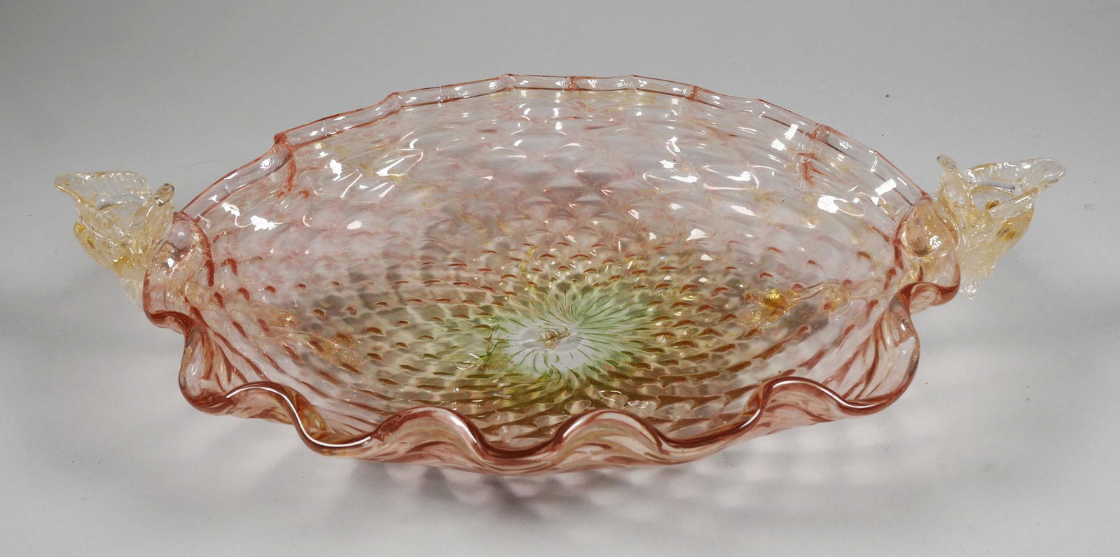 Vintage VENETIAN Salviati Console Centerpiece Bowl: Venetian Salviati console bowl with dolphin or fish handles. Italian art glass centerpiece bowl with gold speckle and a swirling quilted design. Approx. 3 7/8" tall x 15.1/4" long x 10 1/4" deep. No c