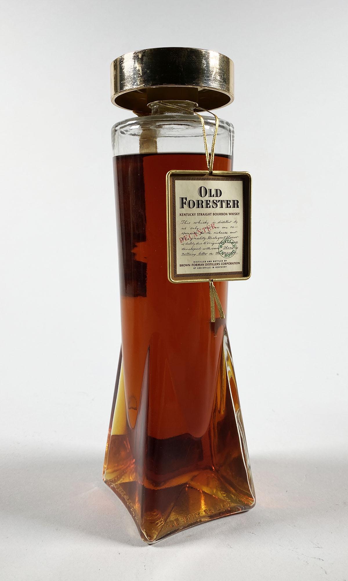 Rare OLD FORESTER Bourbon Whisky Bottle: Vintage sealed bottle of Old Forester. Tax stamp dated 1960. PLEASE NOTE: This item is being sold as a collectible bottle, and its contents are incidental and not intended for consumption.