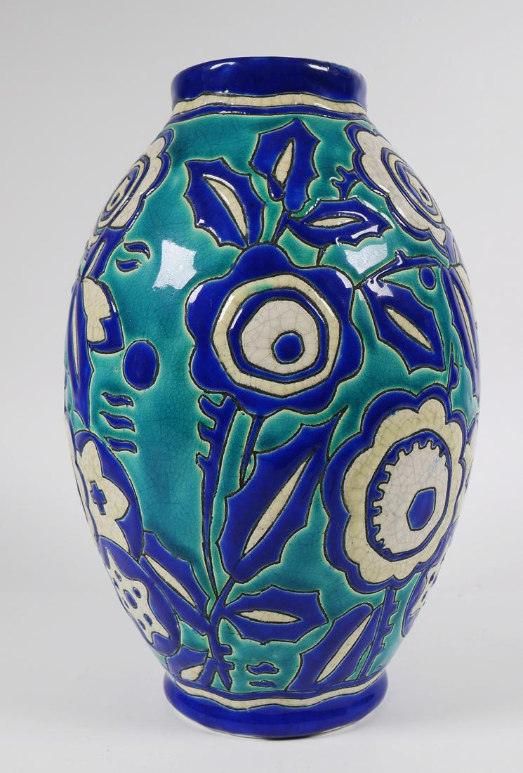 BOCH FRERES Deco Keramis Ceramic Vase: Boch Freres ceramic art deco vase designed by Charles Catteau. Blue and white floral pattern. Shape #899. Approx. 10 3/4" tall x 7" wide. Vase is signed KERAMIS MADE IN BELGIUM. Good condition with no