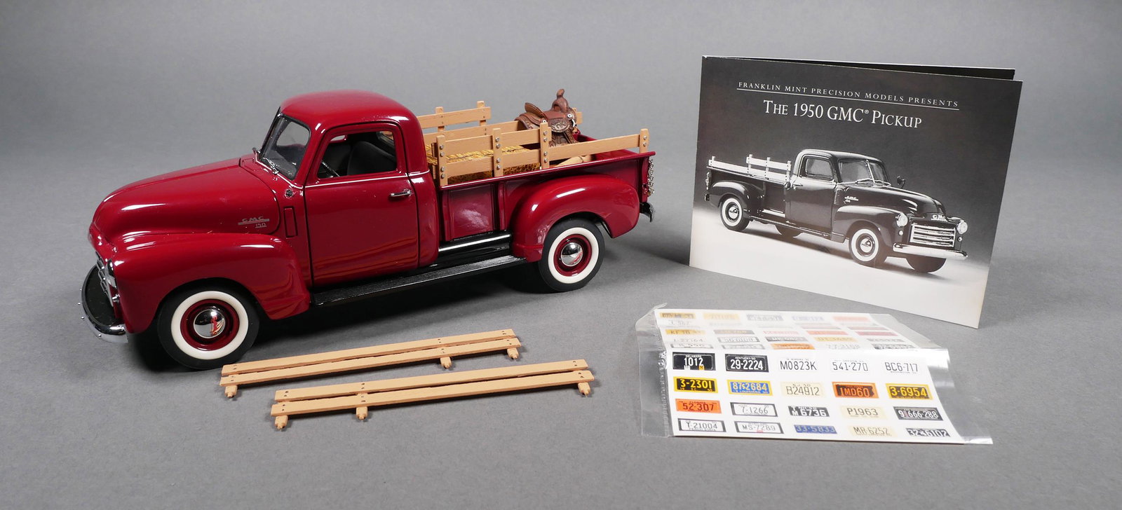 FRANKLIN MINT 1950 GMC Cowboy Pickup Truck: 1:24 scale diecast model of a 1950 GMC pickup truck by Franklin Mint. Truck measures approx. 8 1/4" long. Multiple accessories included, missing cowboy hat and driver side mirror (included) has come o