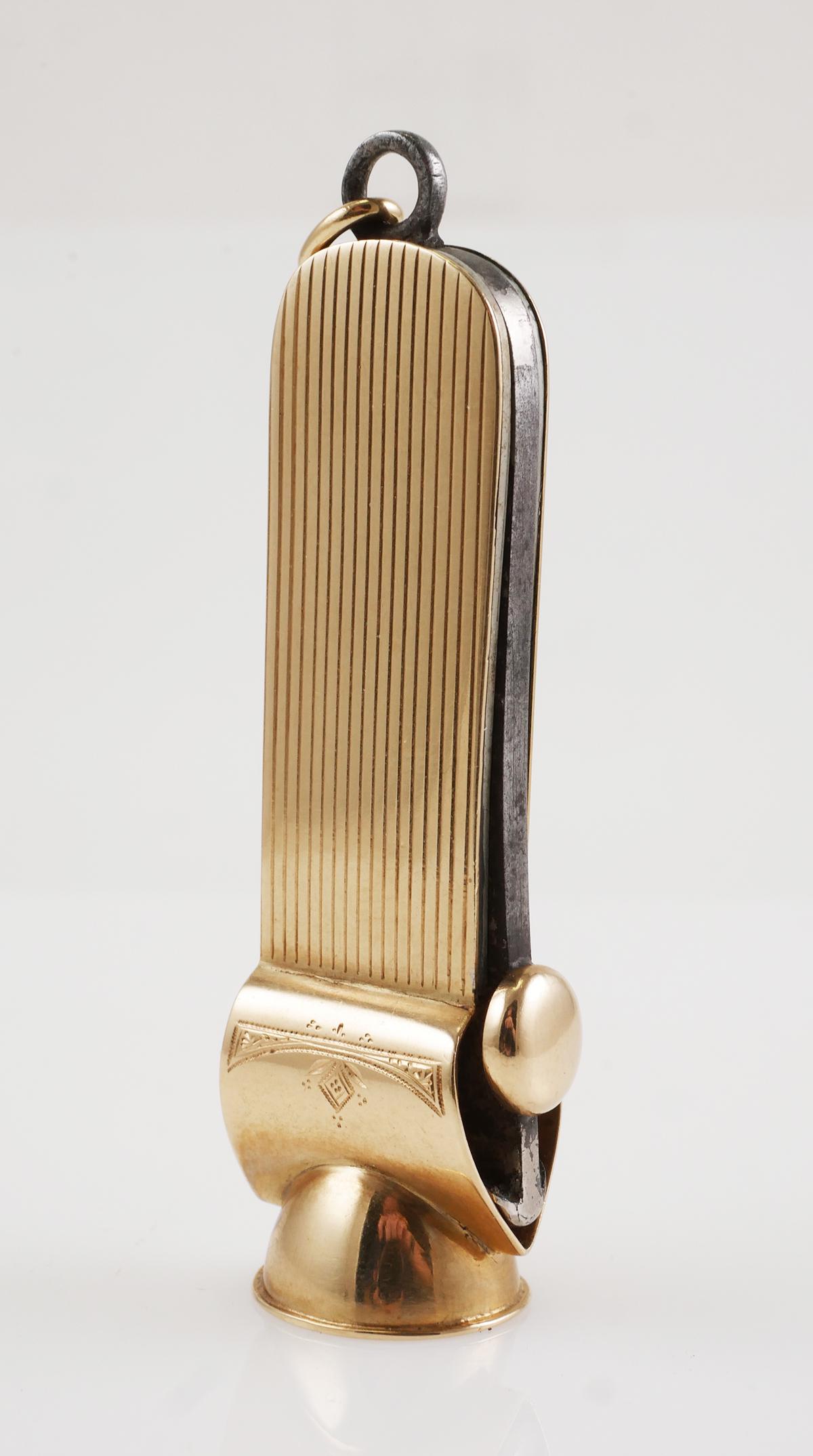 Antique 14K Yellow Gold Cigar Snip Cutter: Antique 14K Yellow Gold Cigar Snip Cutter. Cutter measures 2 1/2" in length, overall weight 28 grams. Hallmarked on bottom. Blade produces V cut. Pendant bail, no monograms. Internal cutter blade/part