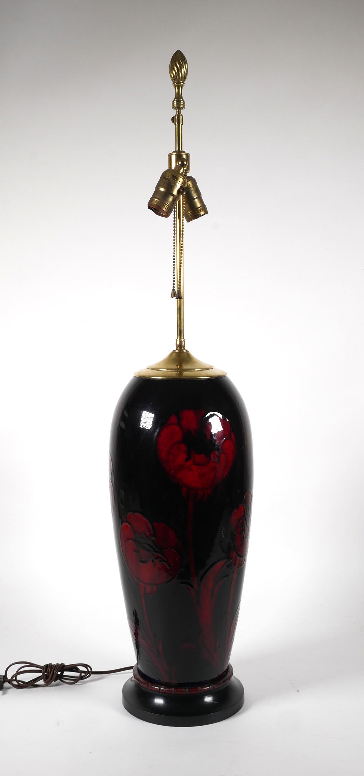 MOORCROFT Poppy Flower Flambe Table Lamp: Vintage Moorcroft floral art pottery poppies motif flambé glaze table lamp. Lamp measures 34" tall x 7 1/2" wide. Lamp fixture is in working condition. Glaze has normal wear and crazing throughout, n