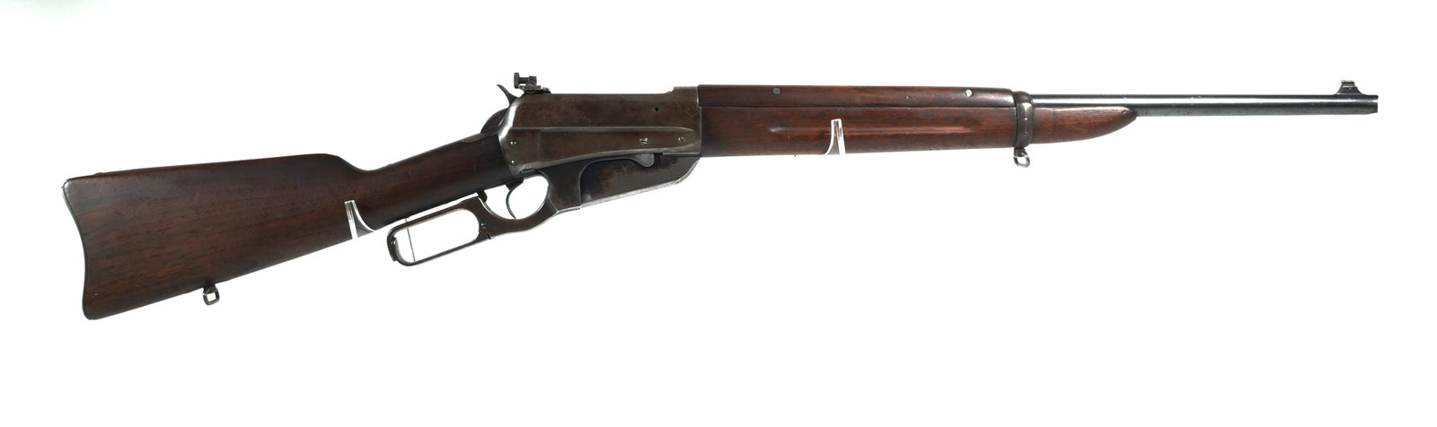 Winchester Model 1895 Lever Action Rifle 30-06: Winchester model 95 carbine lever action rifle. Chambered in .30-06 Government. Serial #417350. Barrel measures approx. 21 7/8". Lyman adjustible peep sight. Finish is in good condition with normal we