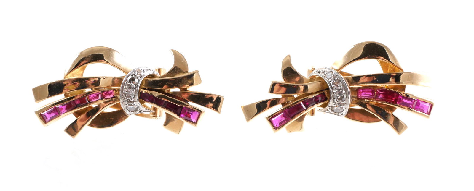 Pair 14K RUBY DIAMOND Earrings: 14K yellow gold, diamond and ruby earrings in a timeless fancy bowtie design. Earrings have omega backs are approx. 1 1/4" in length. Total weight is 13.3 grams. Earrings have age appropriate wear wit
