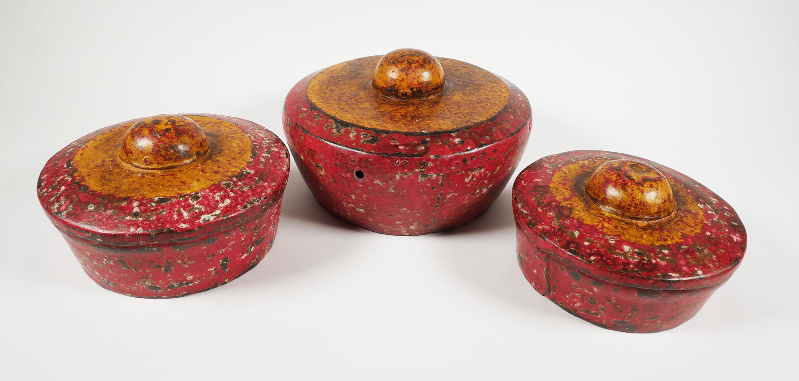 (3) Bali Java Indonesian Bonang Kettle Gong: Three handpainted speckled red and yellow bonang gong musical instruments. The percussion instruments, used in a gamelan, are the traditional ensemble music of the Javanese, Sundanese, and Balinese pe