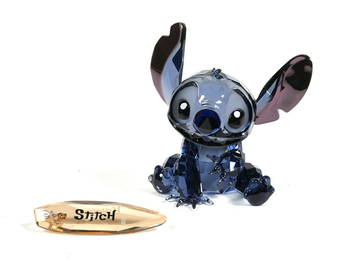 Swarovski Crystal DISNEY STITCH: Retired Swarovski Disney Mickey and Friends - Stitch figurine 1096800. This Swarovski crystal Disney Limited Edition Stitch (from Lilo and Stitch) is only available during 2012. Mint in box. See photo