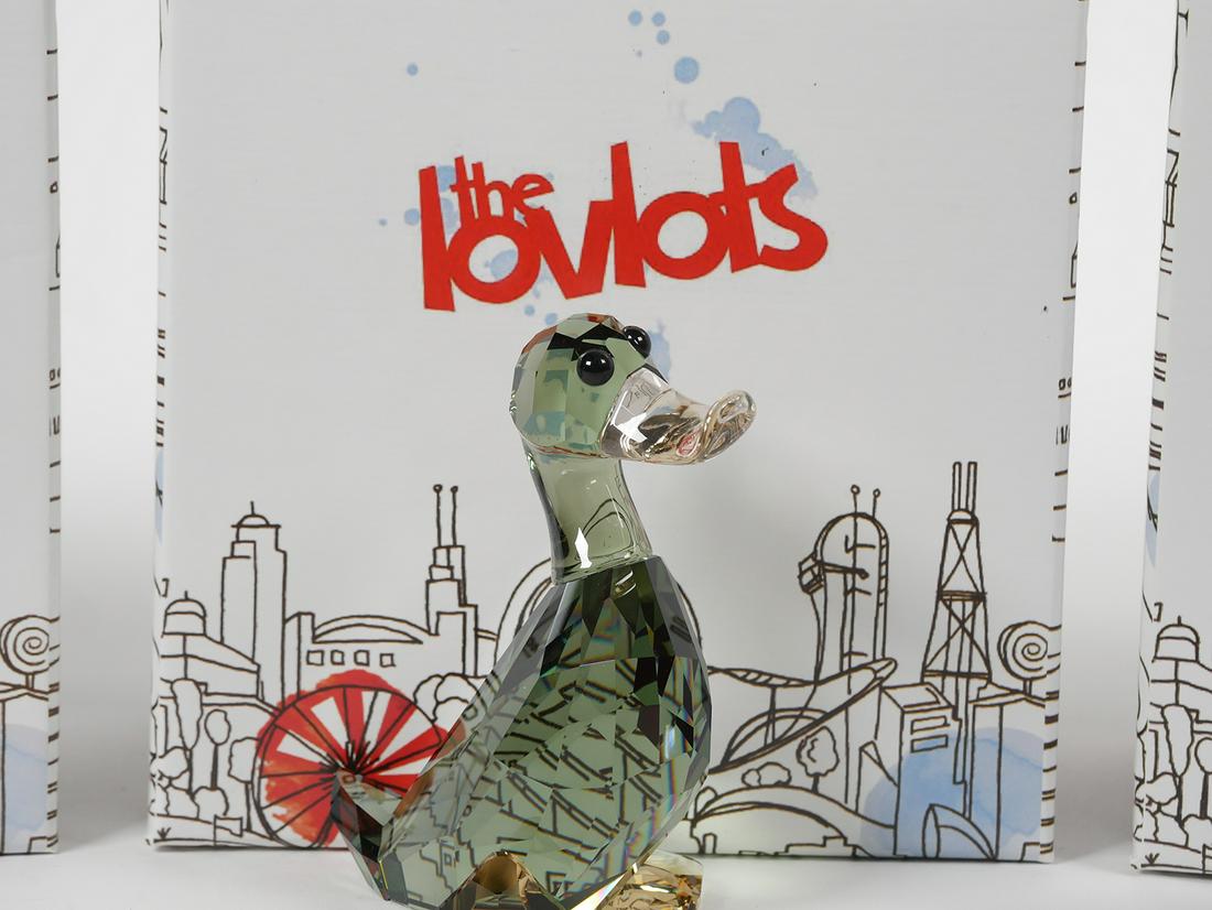 (3) Swarovski Crystal LOVLOTS Figurines: Group of 3 Swarovski crystal Lovlots figurines including Belle Mo 1041285, Duke 1041298 and Circus Leo 1079591. All in mint with boxes. See photos for more details on condition. Please see our other l