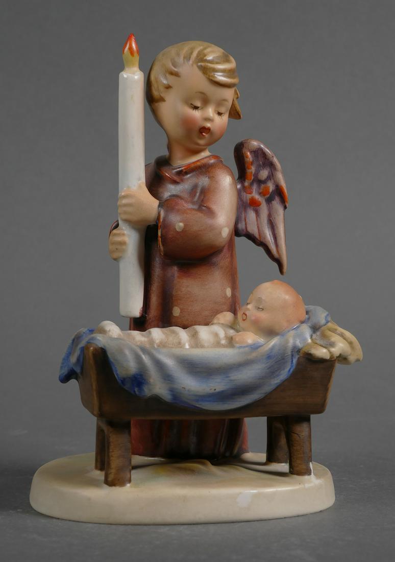 Hummel WATCHFUL ANGEL 194 TMK2: Hummel, Watchful Angel. Hummel measures approx. 6 3/4" tall. Hum 194, TMK-2. No cracks or chips. Base and front right leg of crib have some paint loss, possibly an old repair. Crazing present. No box.