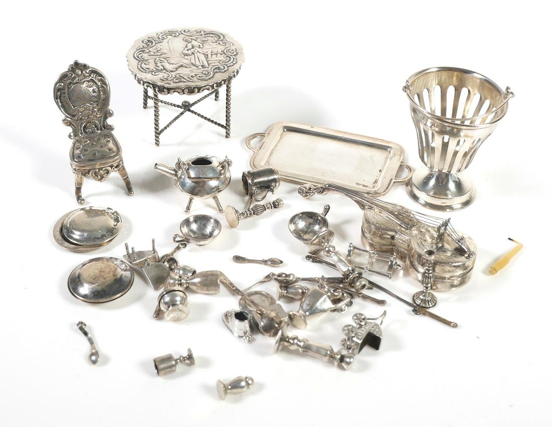 Collection of Vintage Sterling Silver Miniatures: Vintage collection of sterling silver Miniatures. Some are marked STERLING with hallmarks. Largest (table) measures approx. 2" in diameter x 1 3/8" tall. Overall weight: 156.8 grams. Very good conditi