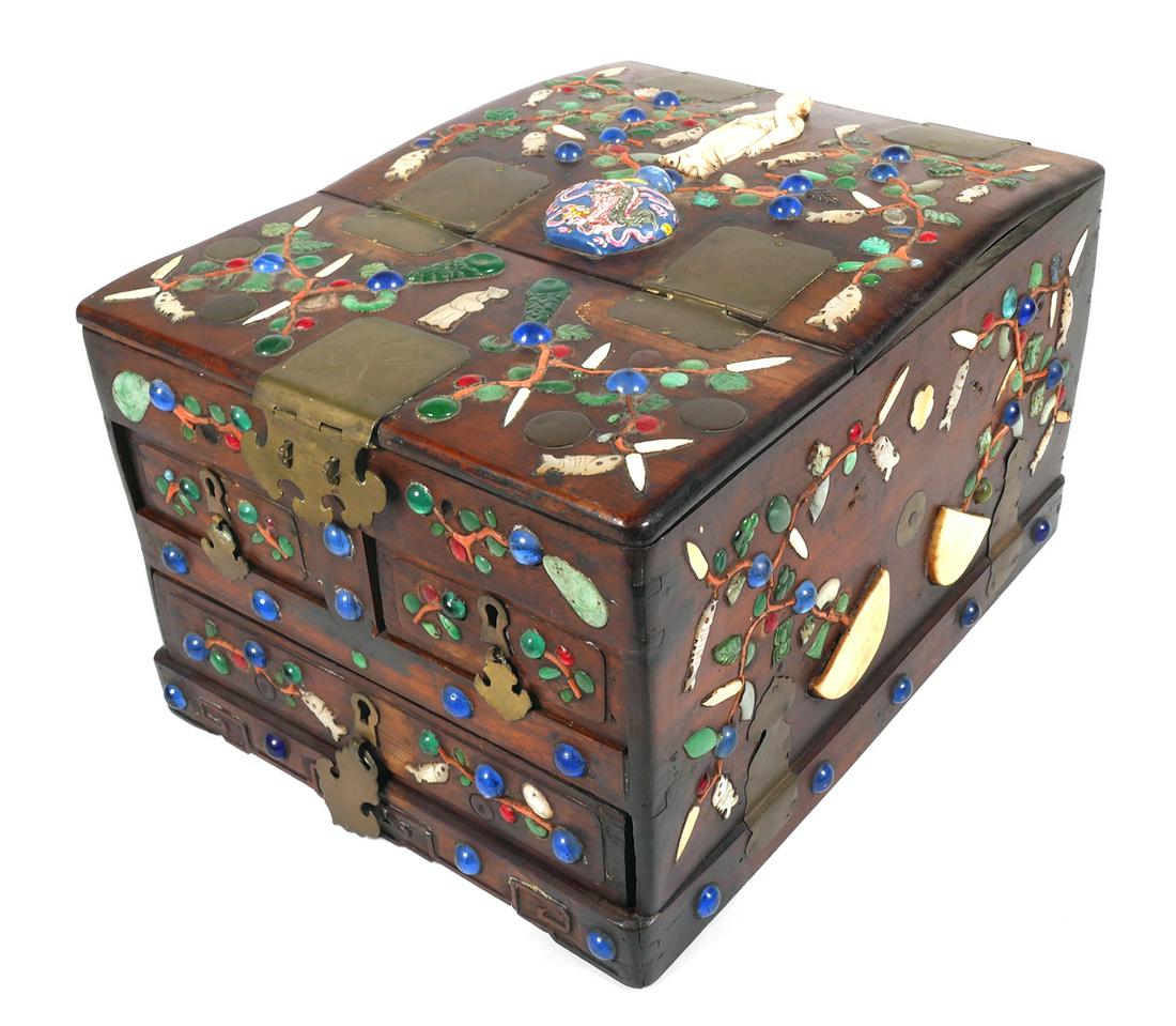 Antique Chinese Rosewood Vanity and Folding Mirror: Early Chinese vanity box with fold out mirror. Vanity is adorned with jade, MOP, blue and red cabochons on five sides. 3 drawers with two keys. Overall measurements 12 1/2" x 9 1/4" x 7". Box has age 