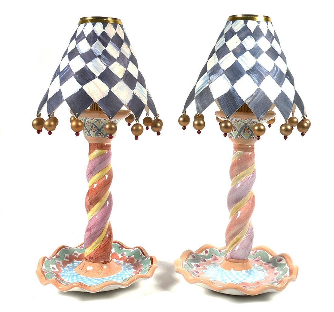Pair MACKENZIE CHILDS Heather Pottery Candlesticks: Mackenzie Childs art pottery "Heather" pattern candle holders. Each measures approx. 8 1/2" tall x 6" diameter base. Two candle Followers and Mackenzie Childs paper shades included. Candlesticks are i