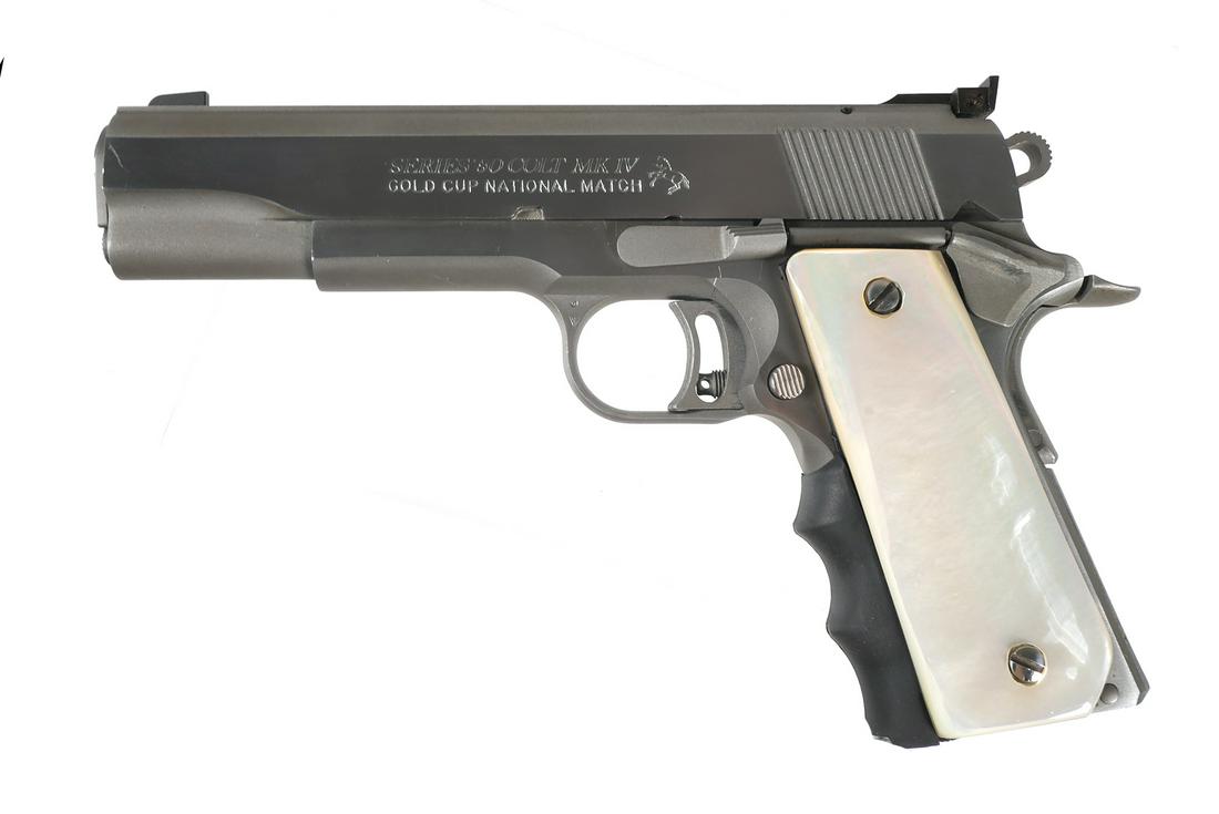 COLT 1911 Gold Cup National Match .45 ACP Pistol: Series 80 Colt MKIV Gold Cup National Match 1911 45 ACP semi-automatic pistol. Barrel measures 5". Two Colt factory 8 round magazines and hard shell box included. Excellent condition with light handli