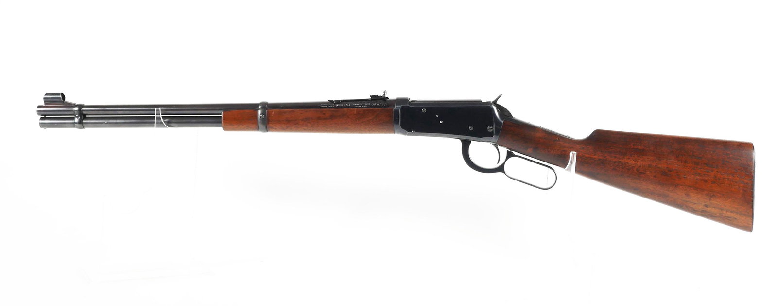 WINCHESTER Model 94 Lever Rifle 30 WCF: Winchester model 94 lever action rifle in 30 WCF cal. Serial #1217967 (circa 1941). Barrel measures approx. 20", 37 3/4" overall. Finish has light wear with a small spot of loss on the underside and f