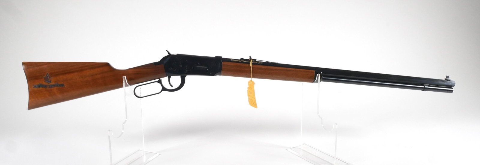 WINCHESTER 94 .30-30 Canadian Centennial: Winchester Canadian Centennial Commemorative rifle in 30-30 with a 6+1 ammo capacity and a 26? octagon barrel. Serial #17128. This lever action rifle is in excellent condition, unfired with minimal we