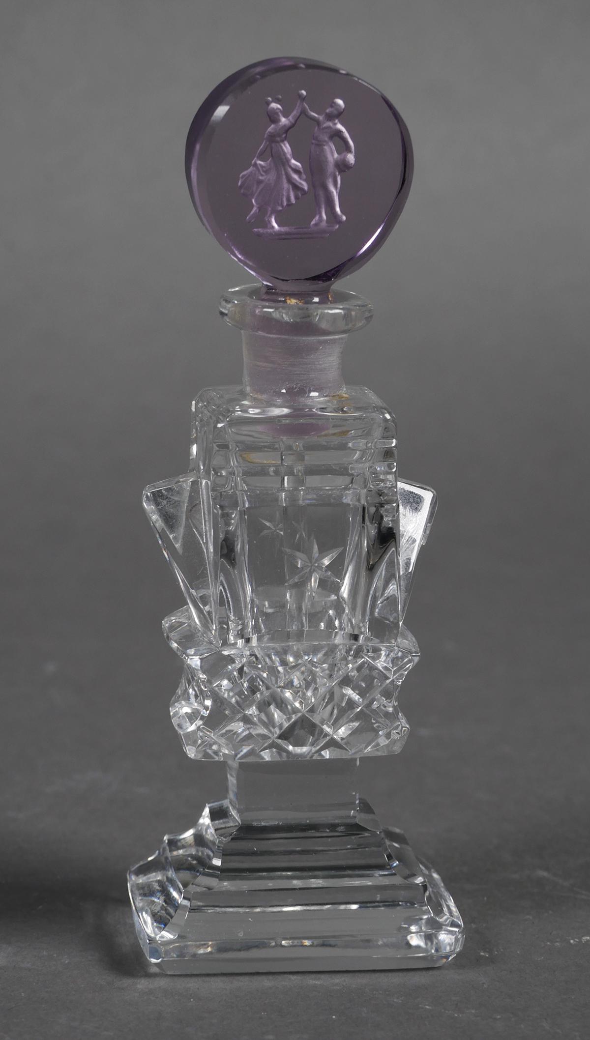 Vintage CZECH Perfume Bottle with Intaglio Stopper: Vintage Czech art glass perfume bottle with amethyst intaglio stopper depicting a man and woman dancing. Base is marked "Made in Czechoslovakia". Bottle measures approx. 5" tall. Very good condition w