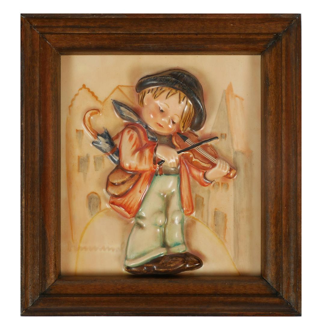 Hummel Wall Plaque 107 LITTLE FIDDLER TM1: Hummel 107 wall plaque of the Little Fiddler in wood frame, TMK1. Rare incised crown. Very limited production. Listed as closed edition 8/1/38. Modeled by Arthur Moeller in 1938. Similar to all-cerami