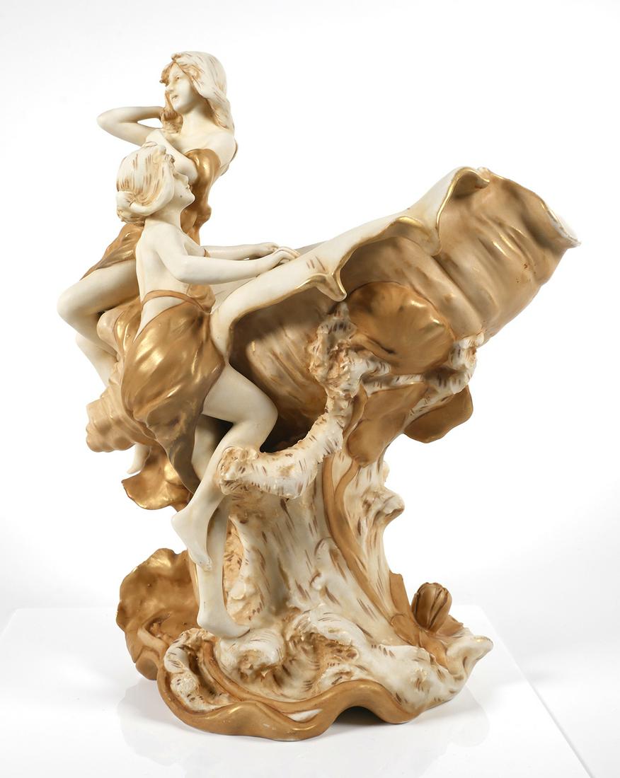Large Royal Dux Art Nouveau Ceramic Figural Bowl: Vintage Royal Dux Bohemia conch shell bowl or vase with sea nymph maidens. This Art Nouveau porcelain centerpiece depicts two partially nude female figures on a conch seashell. The piece is marked, ��
