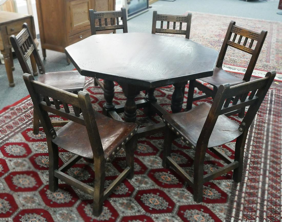 1920's Florida Granada Shops Table and Chairs: Antique Florida pine octagon dining table with 6 chairs made by The Granada Shops. The shop was located in the Coral Gables Crafts Section and sold decorative brocade style furniture to the well-to-do