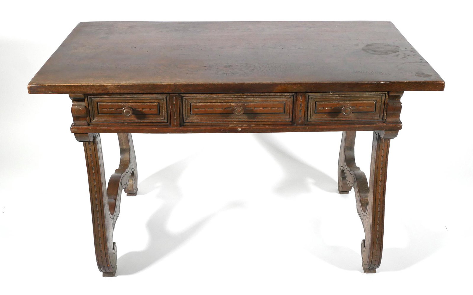1920's Florida Granada Shops 3 Drawer Desk: Antique pine hand carved desk made by The Granada Shops. The shop was located in the Coral Gables Crafts Section and sold decorative brocade style furniture to the well-to-do of Miami. Granada name pl